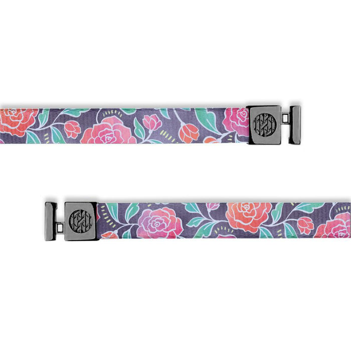 Flat hoodie string. Design is a purple background with red and pink cartoon flowers all over. Inside reads "Today I Will Not Worry" and the aglets are black.