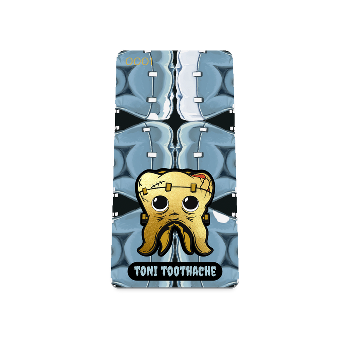 Product photo of the front of the collector’s of 2021 - Day 13 - Toni Toothache. It has a black background with repeating light blue x-ray teeth and one gold Frankenstein-like tooth with a pouting face. Light blue 'TONI TOOTHACHE' text.