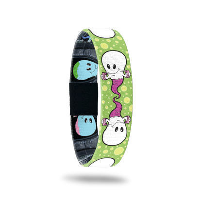 Green bracelet with yellow dots. The monster is white and hot pink and is drinking from two pink juice boxes. Comes with a matching monster pin.