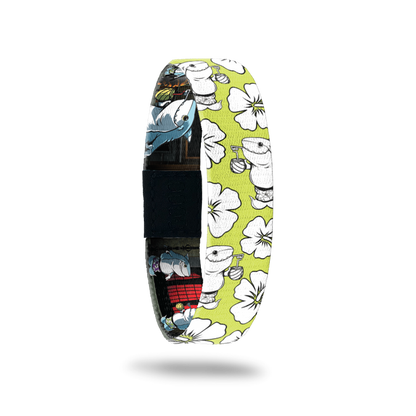 Bright yellow bracelet with Hawaiian flowers all over in white. The monster is a shark, smiling while drinking an adult beverage from a coconut in his swim trunks. Comes with a matching monster pin.