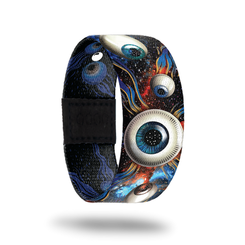 Space background with different colored eyeballs. Inside is the same in a monochromatic color and says All Eyes On Me. Comes with a matching lapel pin.