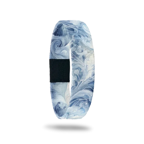 Blue and white swirl/smoke design all over. Inside is the same and reads Be The Storm.
