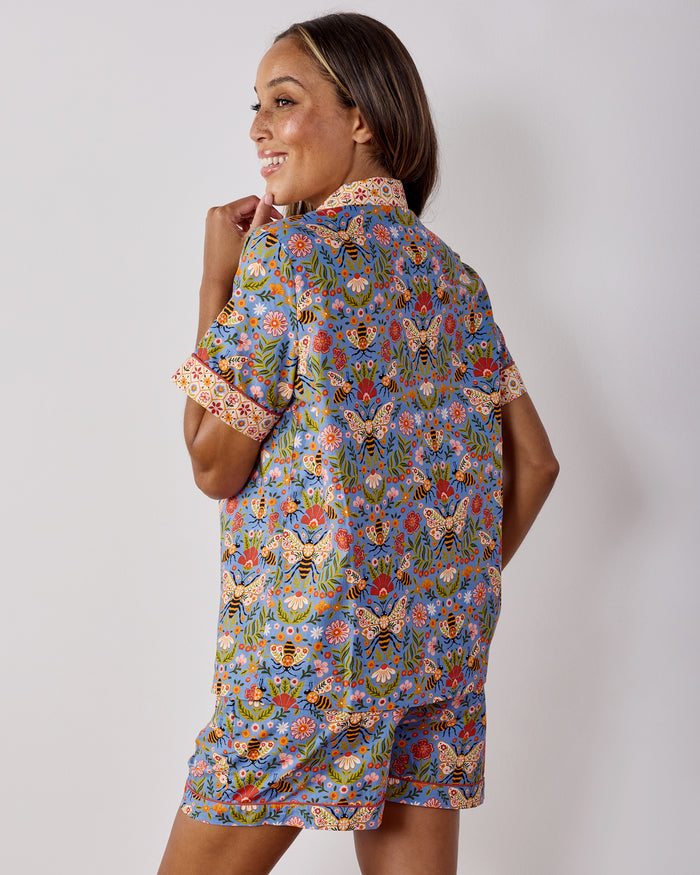 Back view of the Delphinium Blue Bee Tapestry short pajama set, showing the matching printed top and shorts.