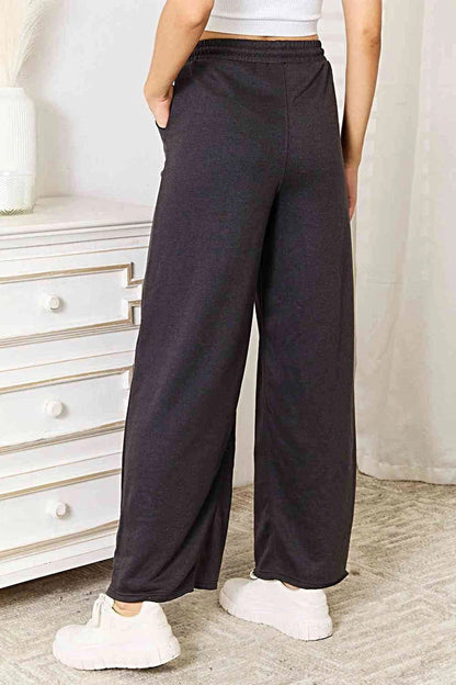 Chic Wide Leg Pocketed Pants for Effortless Elegance - Opaque Fabric & Versatile Style Trendsi