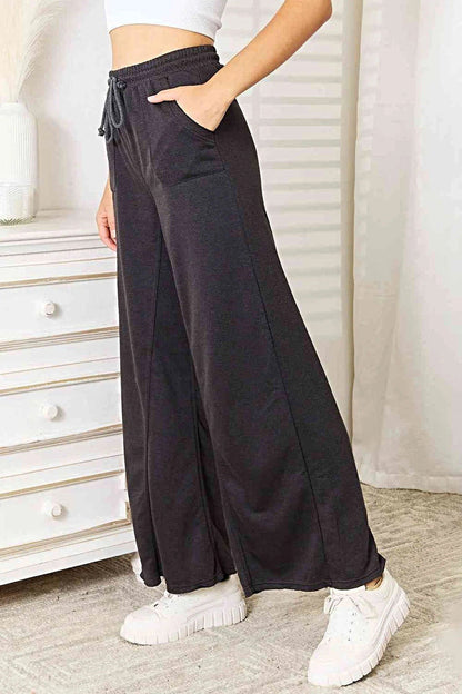 Chic Wide Leg Pocketed Pants for Effortless Elegance - Opaque Fabric & Versatile Style Trendsi