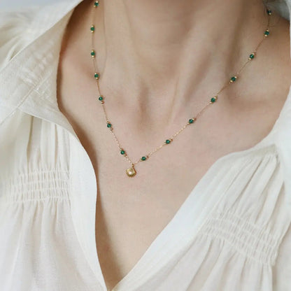 Delicate Gold-Plated Shell Pendant Necklace with Green Glass Beads Crushes.