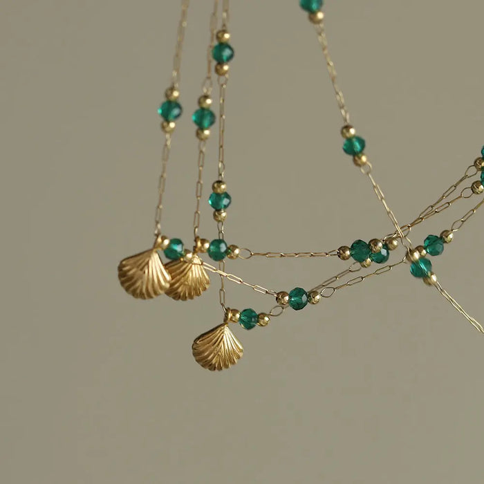 Delicate Gold-Plated Shell Pendant Necklace with Green Glass Beads Crushes.