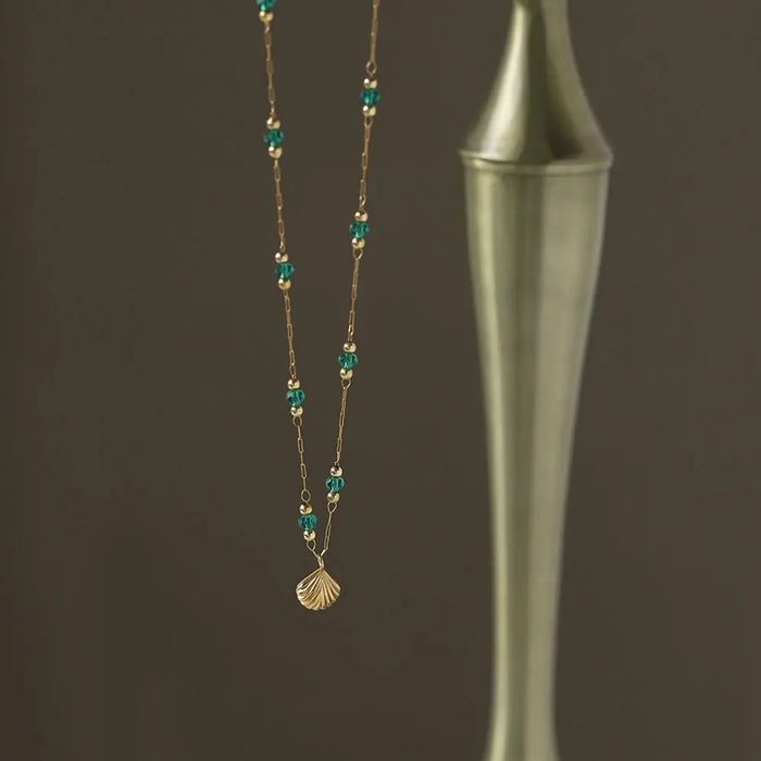 Delicate Gold-Plated Shell Pendant Necklace with Green Glass Beads Crushes.
