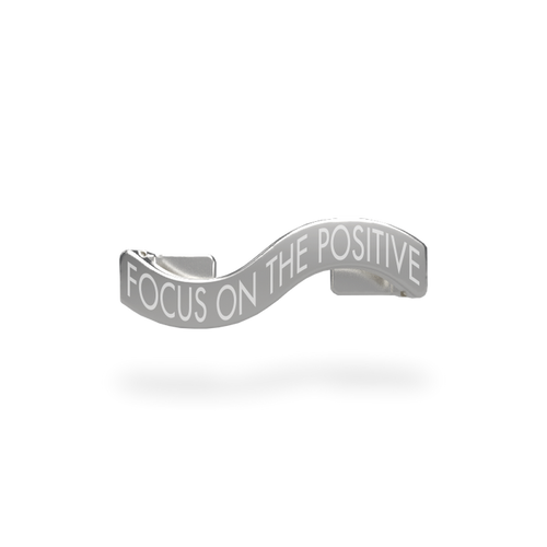 This is a charm that fits ZOX single wristbands, lanyards and hoodie strings only. It is made from stainless steel and is silver in color. The words FOCUS ON THE POSITIVE are etched in the metal.