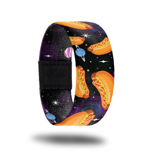 Outside design of Franks In Space. Dark space background with a few small illustrated planets and larger cartoon illustrated hotdogs with condiments spread across randomly