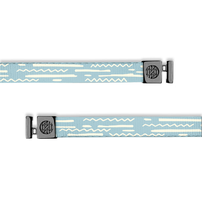 Flat hoodie string. Design is pale blue with off-white geometric lines and zig zags. Inside reads "God's Plan" and aglets are black.