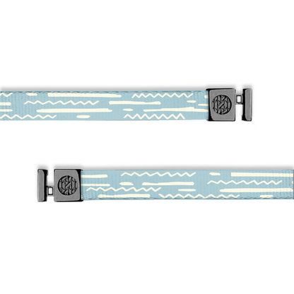 Flat hoodie string. Design is pale blue with off-white geometric lines and zig zags. Inside reads "God's Plan" and aglets are black.