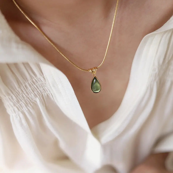 Gold-Plated Teardrop Pendant Necklace with Green Synthetic Cat Eye Stone Crushes.