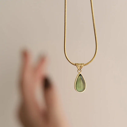 Gold-Plated Teardrop Pendant Necklace with Green Synthetic Cat Eye Stone Crushes.