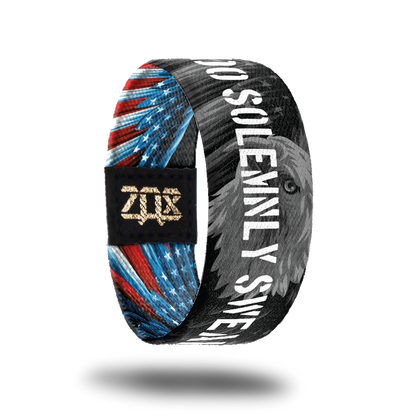 Inside design of I Do Solemnly Swear. Black and grey version of the outside design of the bald eagle with I Do Solemnly Swear in bold white text