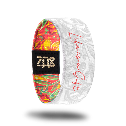 Inside design of Life Is A Gift. Same design as the outside but in soft white and gray. Life Is A Gift is centered on the design in an orange-red thin text