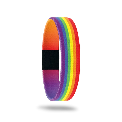 Single wristband with a bright rainbow design. The insdie is gradient multicolored and says Love Wins.