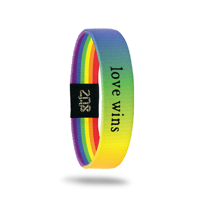 Inside Design of Love Wins: rainbow gradient with black text ‘Love Wins’