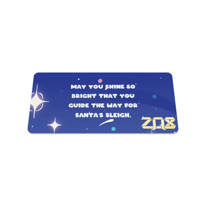 Back of the card is blue with stars and says "May you shine so bright that you guide way for Santa's sleigh"