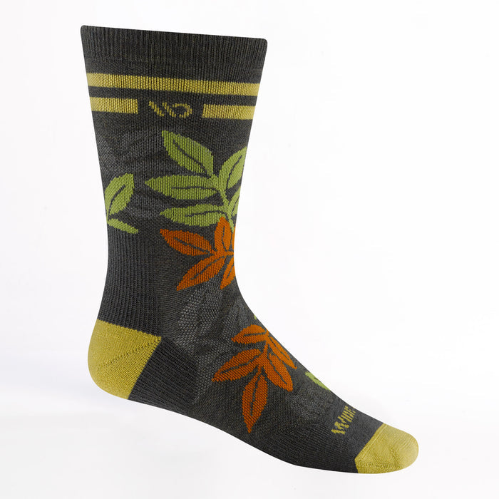 9009 island time cushioned crew in Fern featuring a yellow heel/toe, logo and stripe on the cuff with island foliage on the body