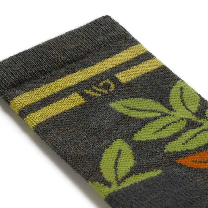 detail image of the 9009 island time cushioned crew in fern featuring a yellow logo and stripe with green foliage