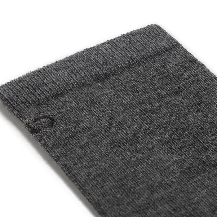 detail image of the 9012 solid lightweight crew in gray featuring black logo on gray body