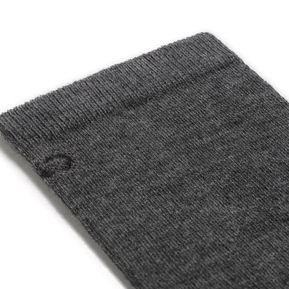 detail image of the 9012 solid lightweight crew in gray featuring black logo on gray body