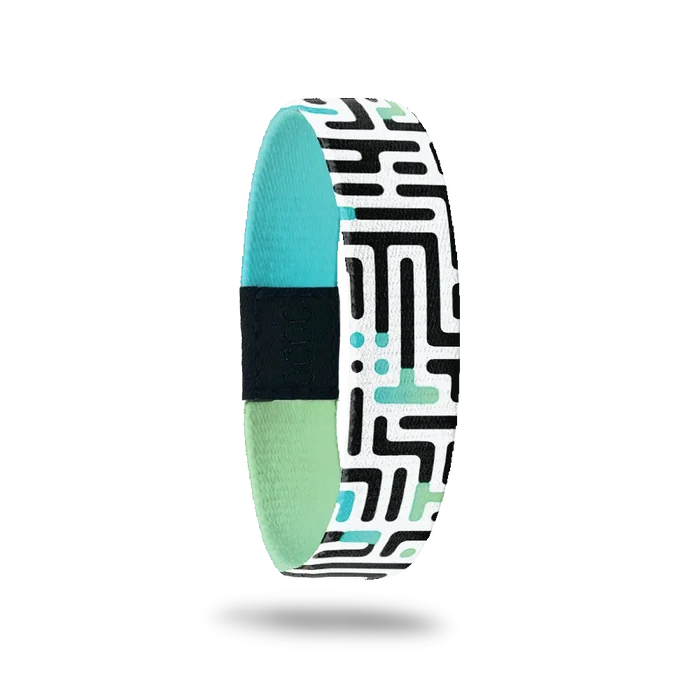 Wristband single. This design has an underlying green and teal gradient effect with black and white maze on top. The inside is the same gradient and reads Never Lose Hope.