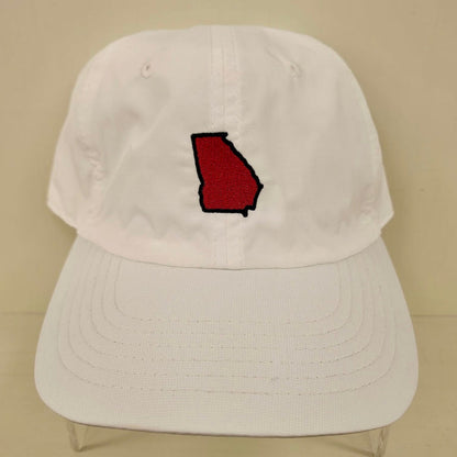 White cap with a red and black logo on a beige background