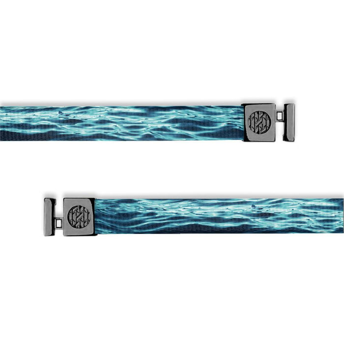 Flat hoodie string. Design is blue and teal rippling water. Inside reads "Persistence" and the aglets are black.