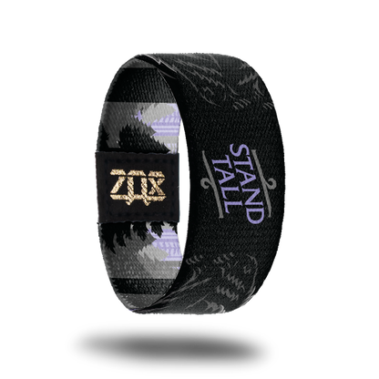 Inside Design of Stand Tall: black background with purple text in the middle 'stand tall' and two standing black bears on the sides of the text