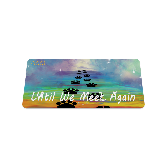 Front collector's card image of Until We Meet Again: rainbow skies with white stars and a darker rainbow bridge with black paw prints going up it with white text 'Until We Meet Again'