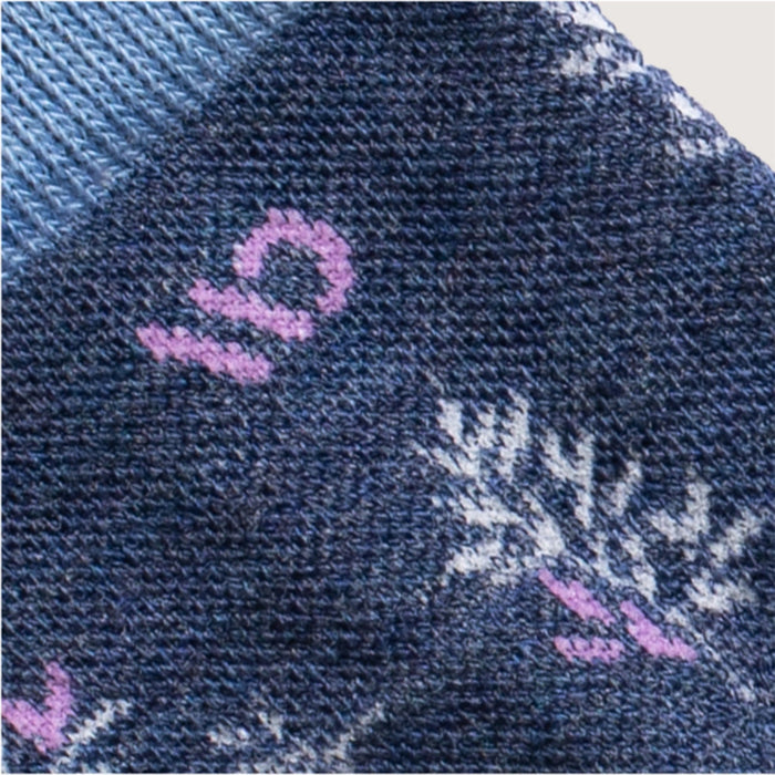 Detail featuring a lavender logo and design in white --Light Gray/Teal/Denim/Taupe