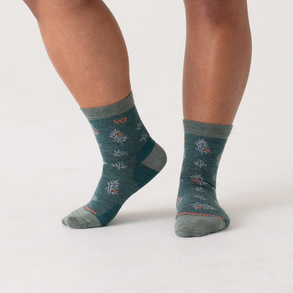 On body of seafoam heel/toe/cuff, teal body, white pattern with orange accents --Teal