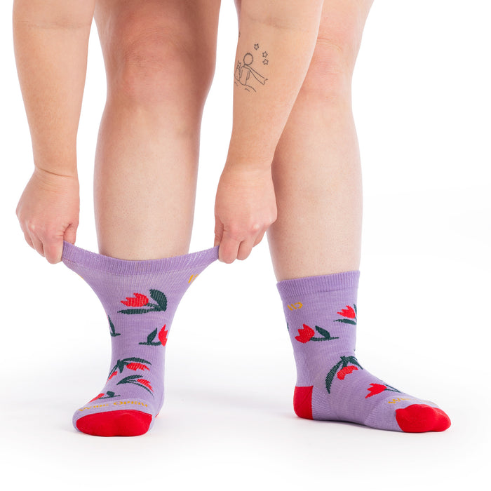 on model image with the cuff being stretched on one foot wearing the 9507 full bloom in tulip purple