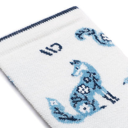 womens woodland wonder in white with a blue fox with flowers on it