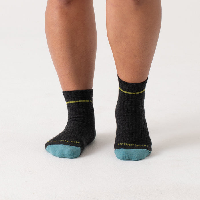 On model quarters, aqua toe, yellow stipe and logo under cuff, charcoal body--Charcoal