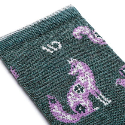 womens woodland wonder cuff in teal featuring a fox in lavender