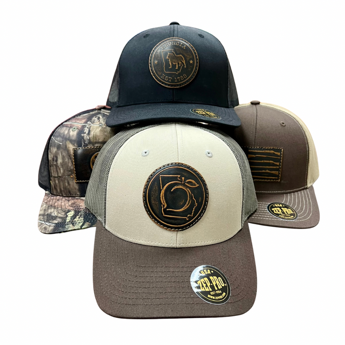 Four different hats with logos on a white background